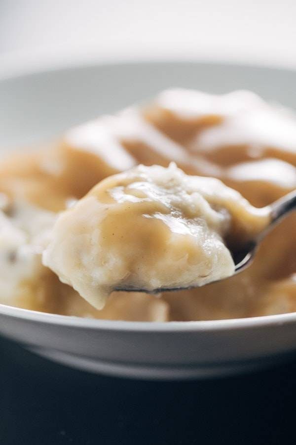 Garlic Mashed Potatoes on a spoon.